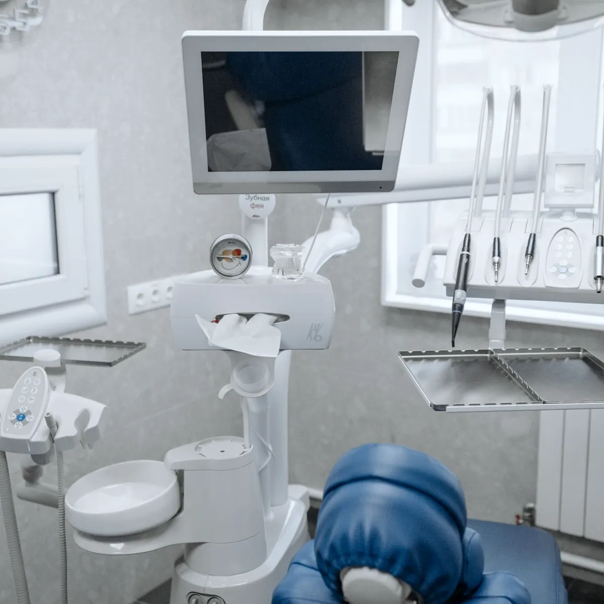Modern dental treatment room with a patient chair